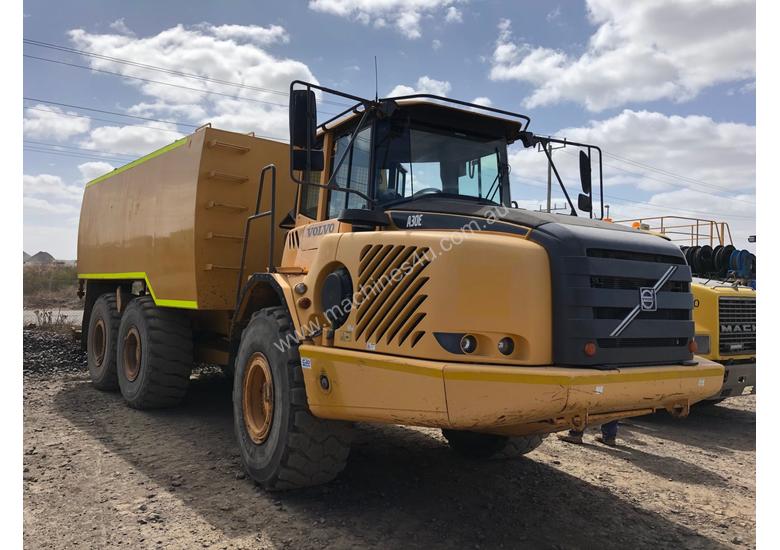 caption Volvo A30E Water Cart & Truck
