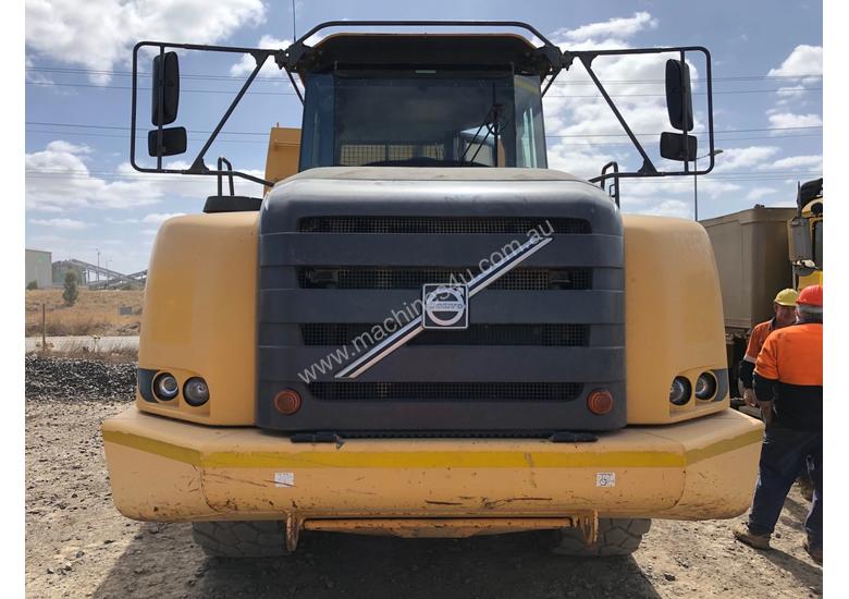 caption Volvo A30E Water Cart & Truck