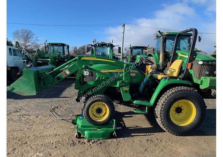 caption John Deere 3320 Compact Utility Tractor