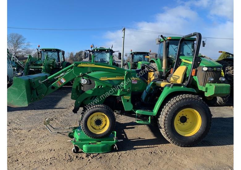 caption John Deere 3320 Compact Utility Tractor