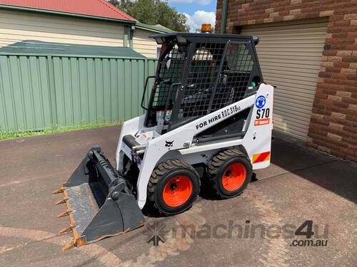 caption 2019 Bobcat Skid Steer – 64 Hours, 4-in-1 Bucket, Great Condition, with Trailer! - Hire