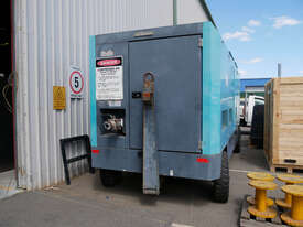AIRMAN 1200cfm Portable Diesel Compressor on Wagon Wheels  - picture0' - Click to enlarge