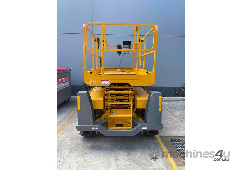 caption Haulotte Compact 12DX - 32ft Rough Terrain Scissor Lift