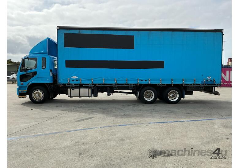 caption 2014 Mitsubishi Fuso Fighter 2427 Curtain Sider