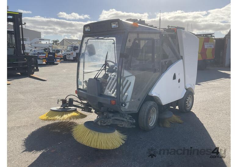 caption Kubota Mini Road Sweeper