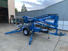 Genie TZ34 Trailer Mounted Boom Lift for hire - picture0' - Click to enlarge