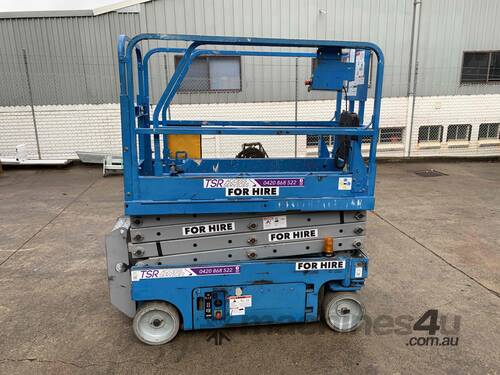 caption Genie GS1932 Electric Scissor Lift – Ideal for Indoor Construction & Maintenance Work! - Hire
