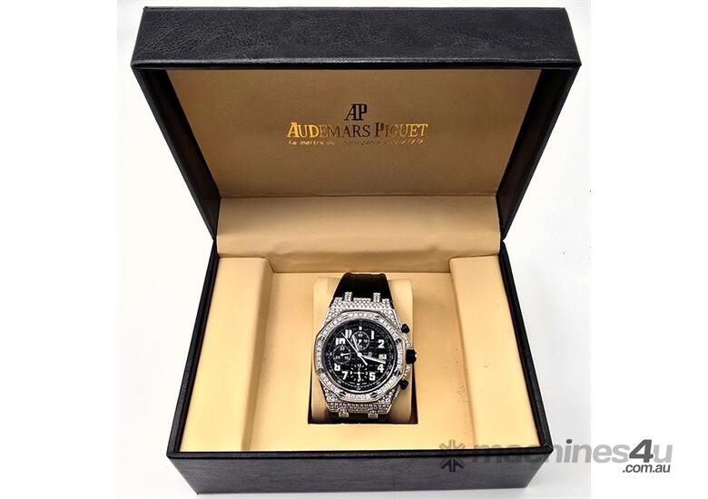 caption AUDEMARS PIGUET DIAMOND ENCRUSTED MENS WATCH