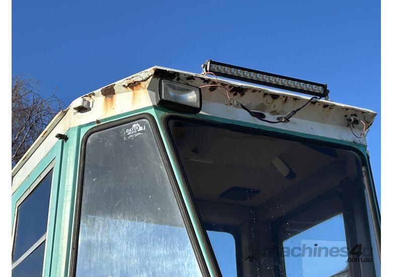 caption 1990 Kobelco LK400 Articulated Wheel Loader