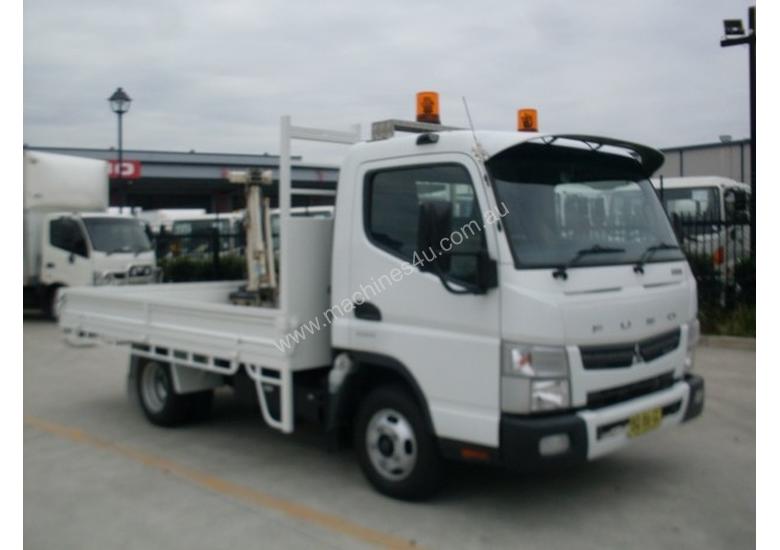 caption Mitsubishi Canter 515 Wide Tray Truck