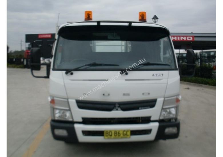 caption Mitsubishi Canter 515 Wide Tray Truck