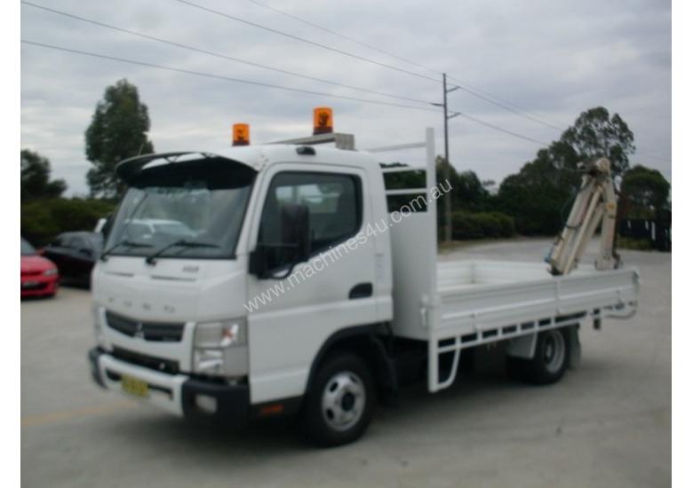 caption Mitsubishi Canter 515 Wide Tray Truck