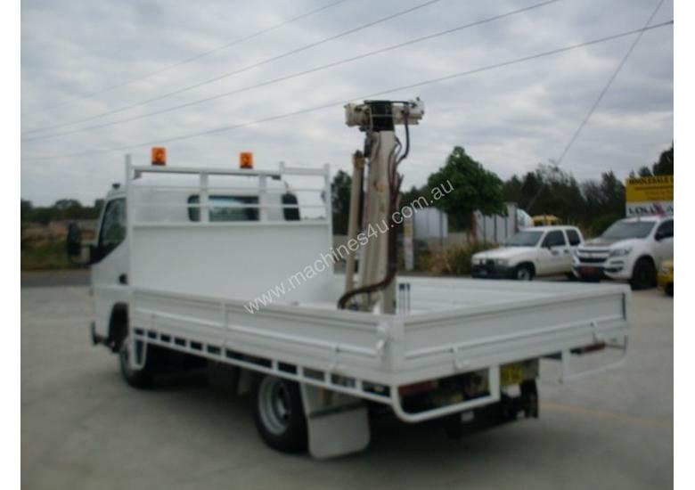 caption Mitsubishi Canter 515 Wide Tray Truck