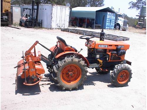 Kubota B7100 tractor and implements
