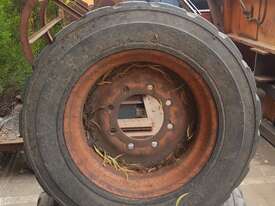 4 x Tyre and rims to suit New Holland LS140 Skid Steer 6 month warranty - picture0' - Click to enlarge