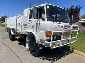 Truck Fire Truck Hino 4x4 1990 2000L 23215km SN1458 - picture0' - Click to enlarge