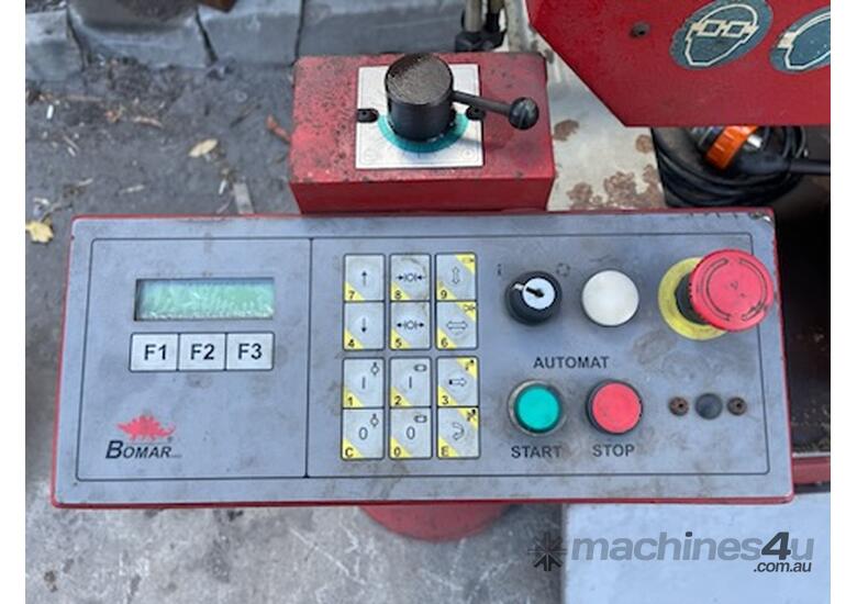 caption Bomar STG 260 DGH Swing Beam Horizontal Bandsaw