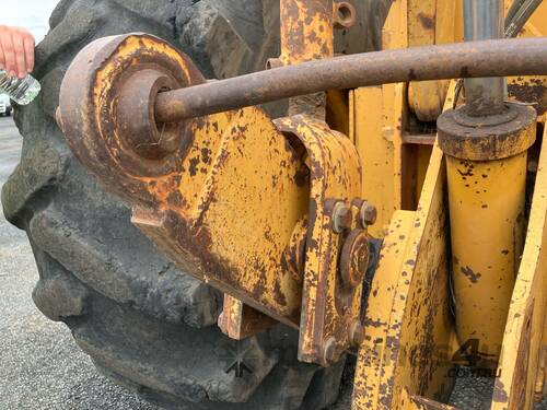 caption 1998 John Deere 648G
