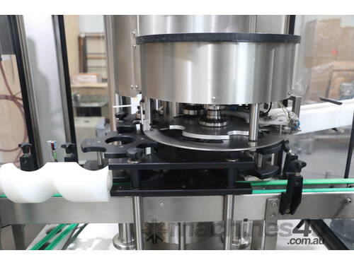 Continuous Plastic Lid Press Capping Machine