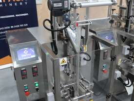 Sachet Machine (1 left) - picture1' - Click to enlarge