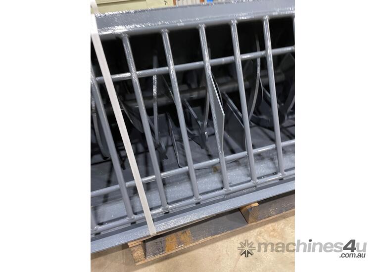 caption New NORM Skidsteer Concrete Batching Bucket attachment