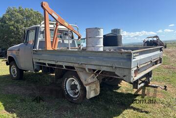 Circa 1970 International C1300 4x4 Tray Truck
