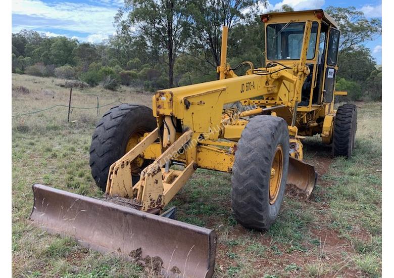 caption 1979 John Deere 670A Grader *CONDITIONS APPLY*