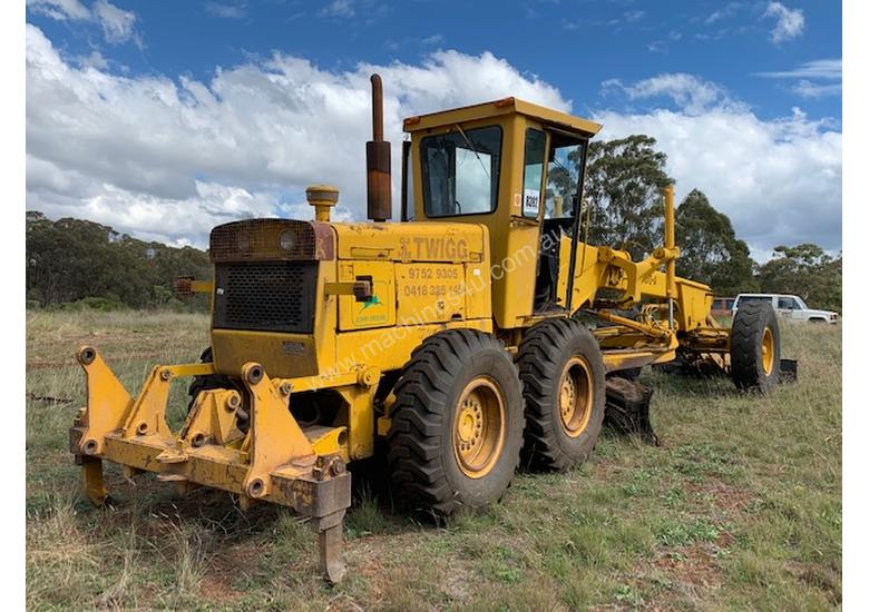caption 1979 John Deere 670A Grader *CONDITIONS APPLY*