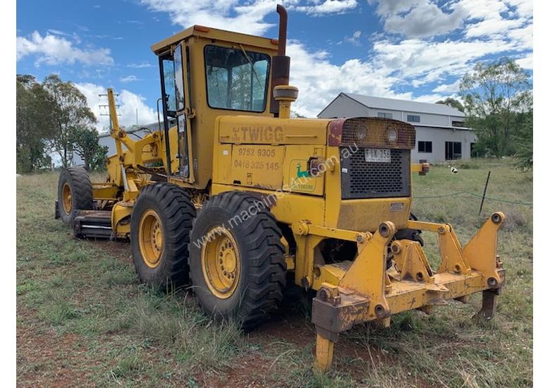 caption 1979 John Deere 670A Grader *CONDITIONS APPLY*