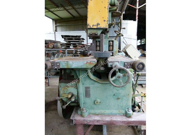 caption Working Robinson 48 inch Band Saw .
