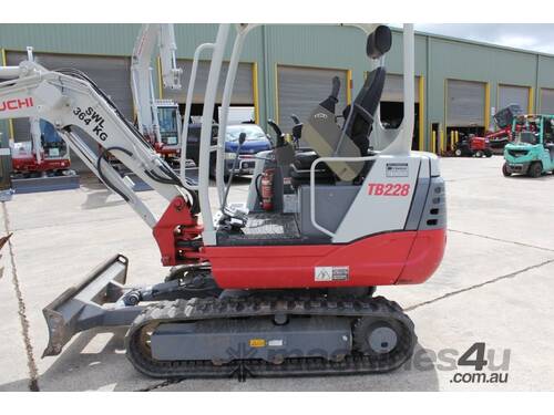 caption Takeuchi TB228 Mini Excavator