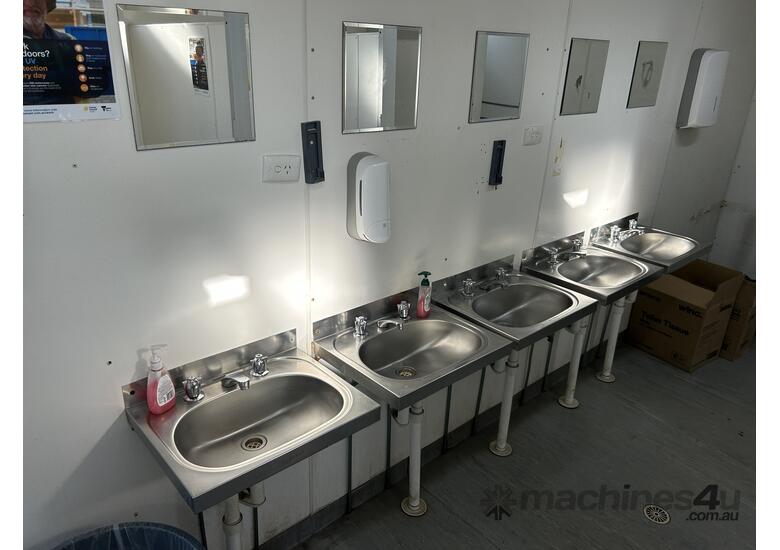 caption ATCO 6m x 3m Portable Toilet Block