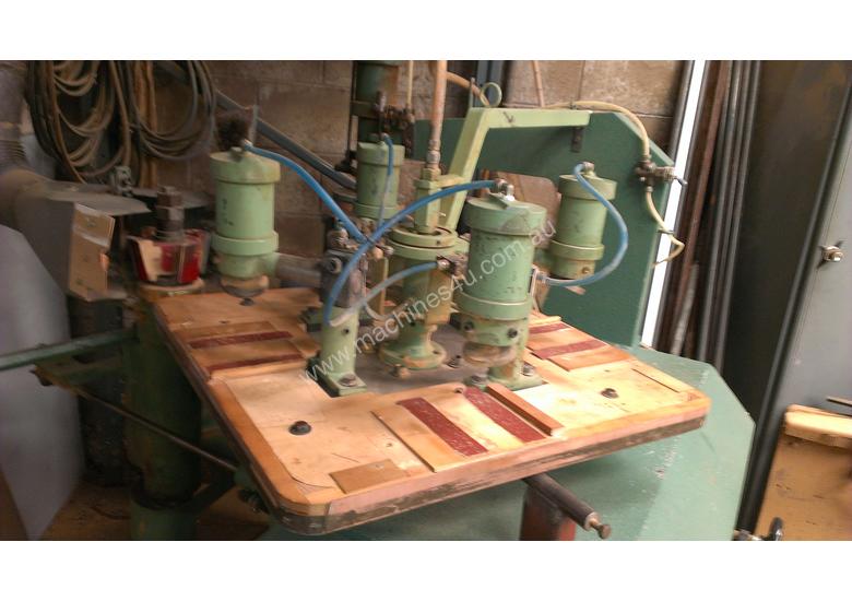 Used 1985 Rotating table spindle moulder with pnuematic clam Three