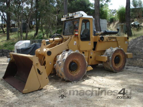 caption Komatsu Hanomag Compactor Loader CL55