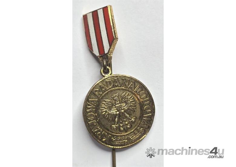 caption TWO WWII PINS