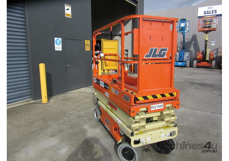 caption For Hire! JLG 1930ES 19ft Electric Scissor Lift – Perfect for Tight Spaces & Elevated Indoor Access!
