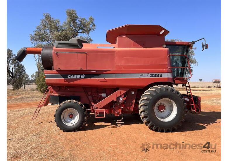 caption 2001 CASE IH 2388 w CASE 1010 30
