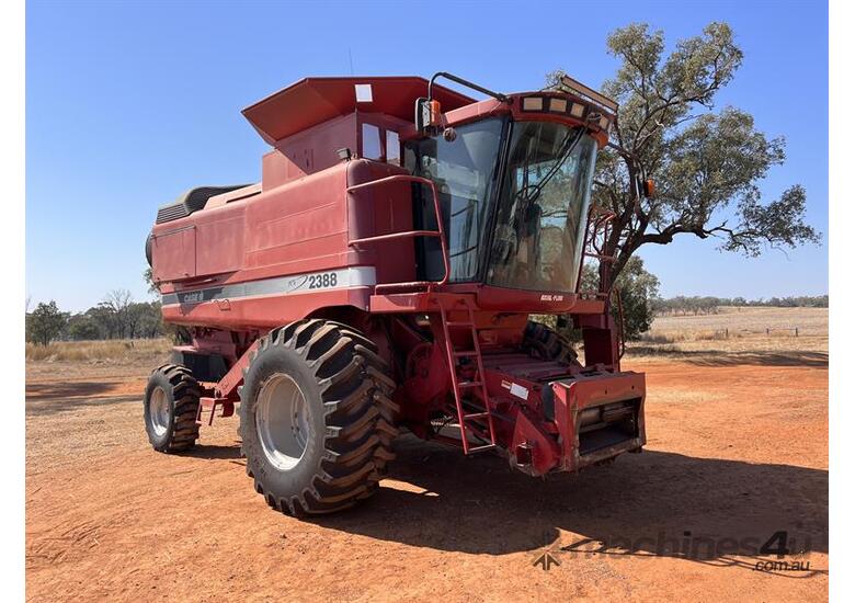 caption 2001 CASE IH 2388 w CASE 1010 30