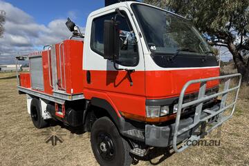 Mitsubishi Fuso Canter FG 4x4 Single Cab Traytop Firetruck. Ex NSW Rural Fire Service. Mitsubishi Fuso Canter FG 4x4 Single Cab Traytop Firetruck. Ex NSW Rural Fire Service.