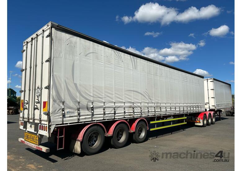caption 2010 Krueger ST-3-38 Tri Axle Curtainsider B Double Combination