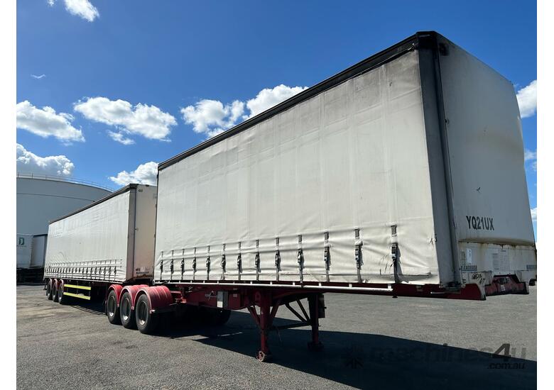 caption 2010 Krueger ST-3-38 Tri Axle Curtainsider B Double Combination