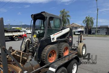 Bobcat Skid steer and trailer