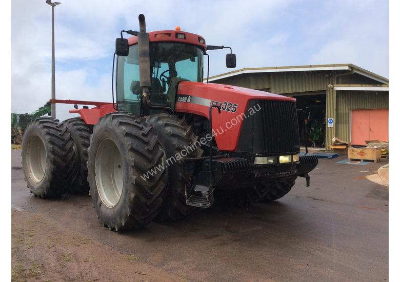caption 2004 CASE IH STX325 325HP Farm Tractor - #502160
