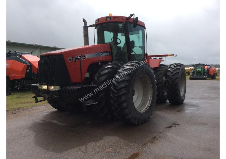 caption 2004 CASE IH STX325 325HP Farm Tractor - #502160
