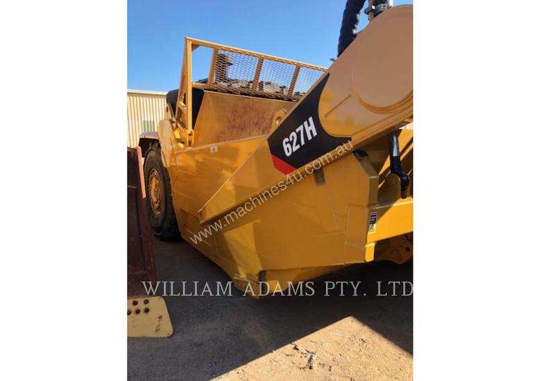 caption CATERPILLAR 627H Scraper Pull Behind