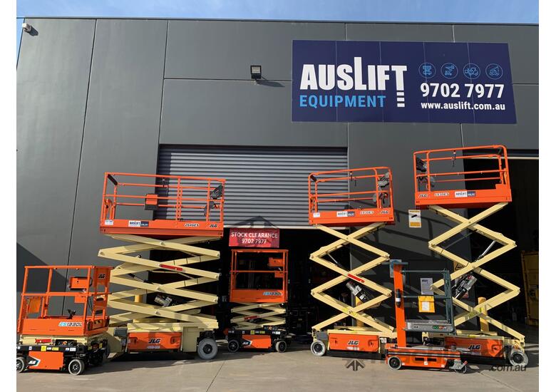 caption For Hire! JLG 26ft Narrow Electric Scissor Lift – Compact, Versatile, and Perfect for Indoor Tasks!
