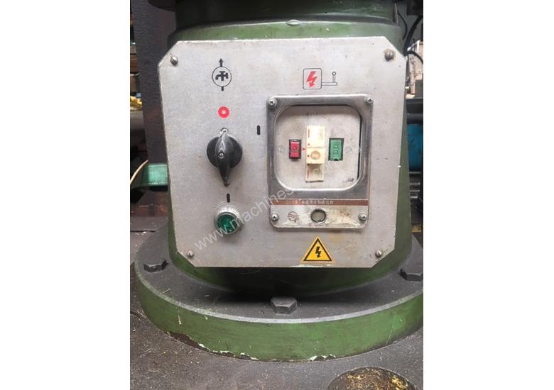caption Radial Arm Drill