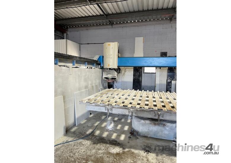 caption Bridge Saw - Denver Space - Stone Cutting Machine