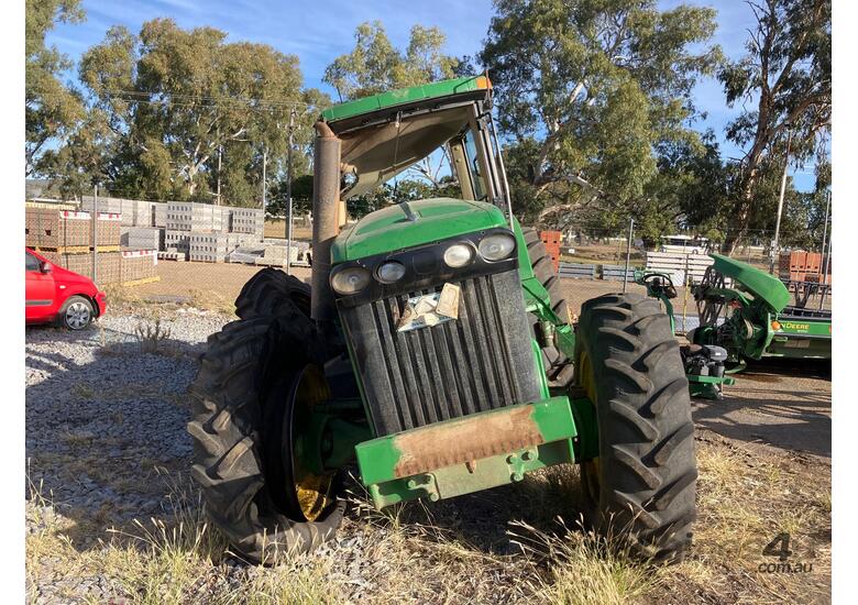 caption John Deere 8220 Tractor
