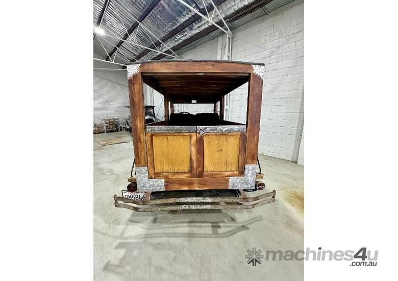 caption circa 1930 Ford Woody Wagon